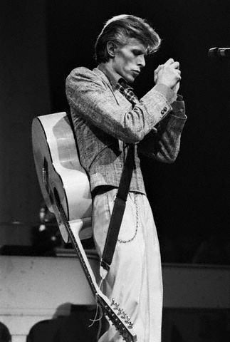 David Bowie with Guitar on Back
